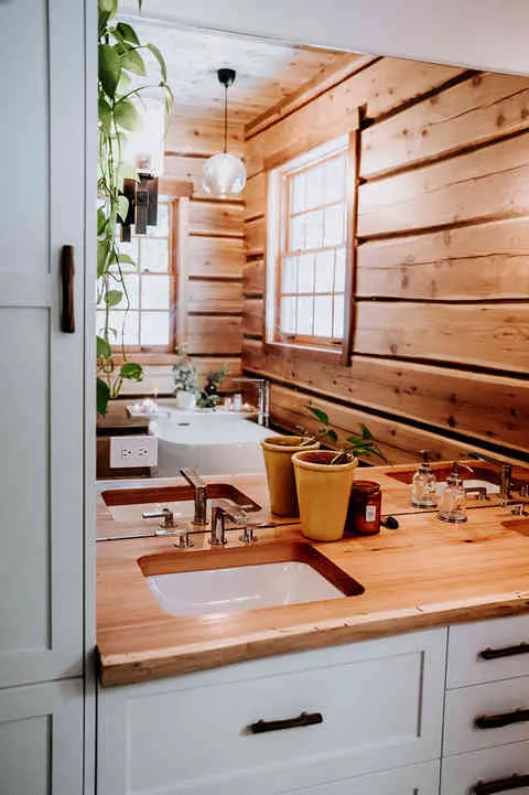 The primary bathroom features a soaking tub with heated backrest.  