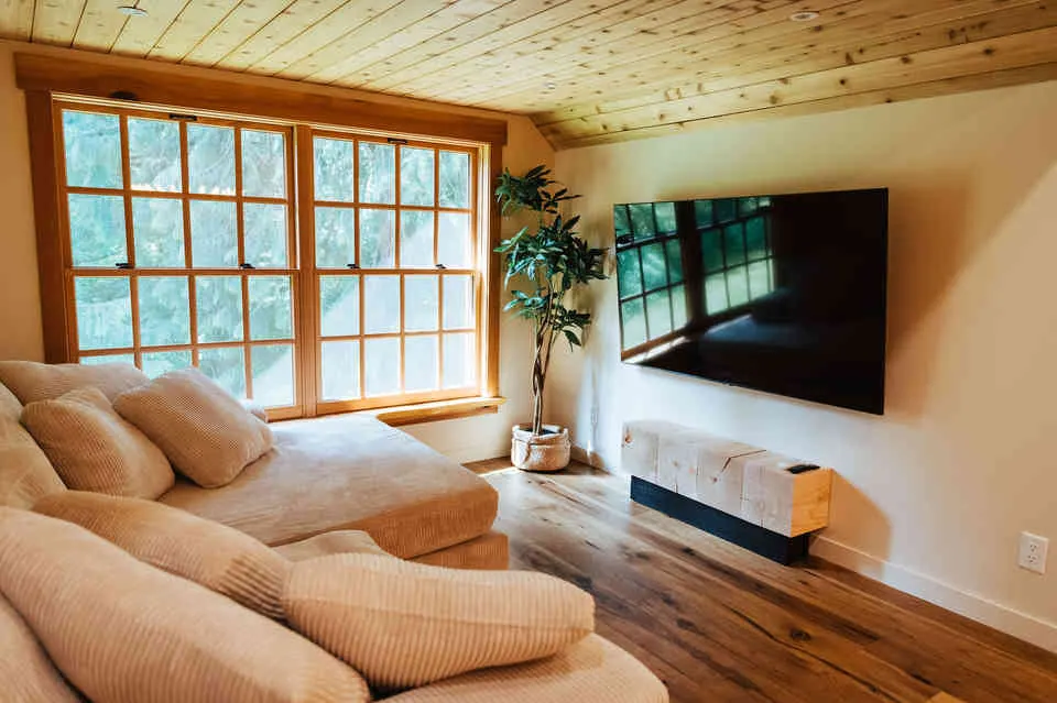 The upstairs living room features a pull out king bed. 